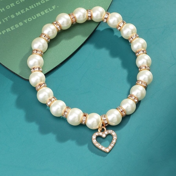 Jewelry - Womens faux pearl and rhinestone accent bracelet with heart charm